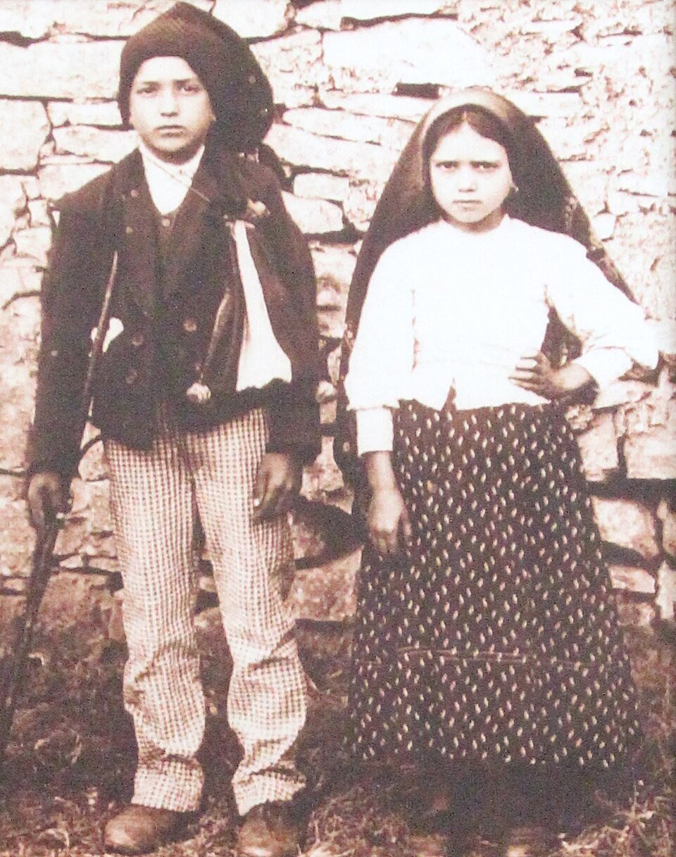 Double portrait photograph of Saints Francisco and Jacinta Marto, the shepherd children of Fatima.